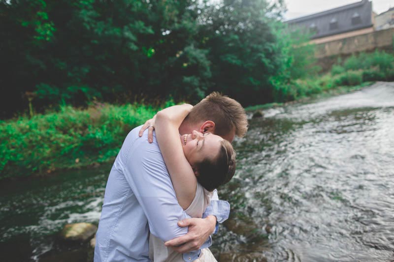 lovers hugging each other by the river Alzette