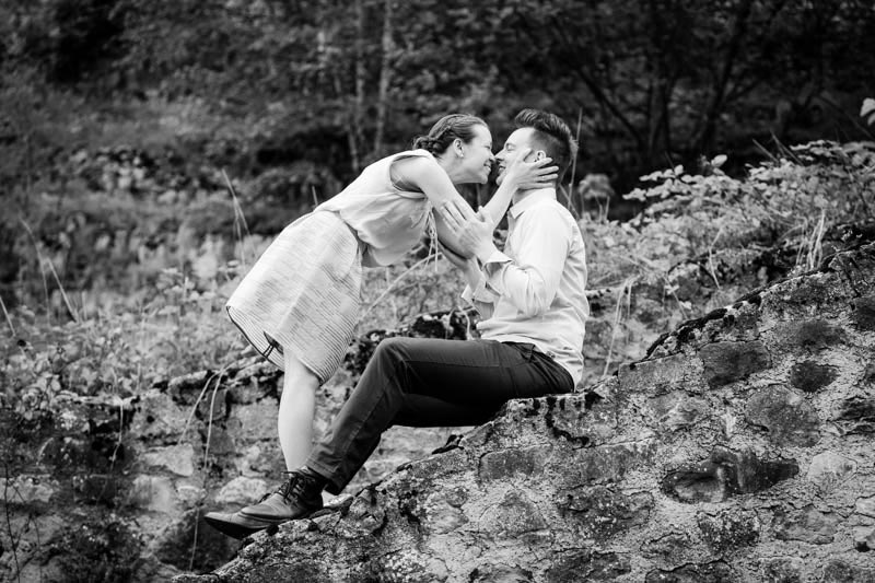 girl holding in her hands the face of her fiancé