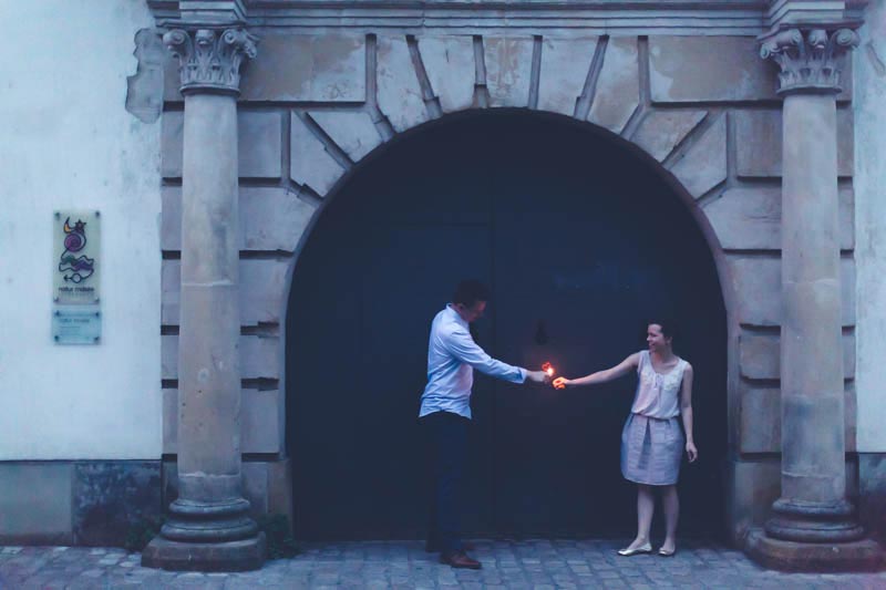 bride and groom lighting up a candle in luxembourg