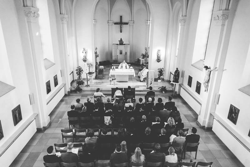 dramatic church photography during wedding at Huncherange