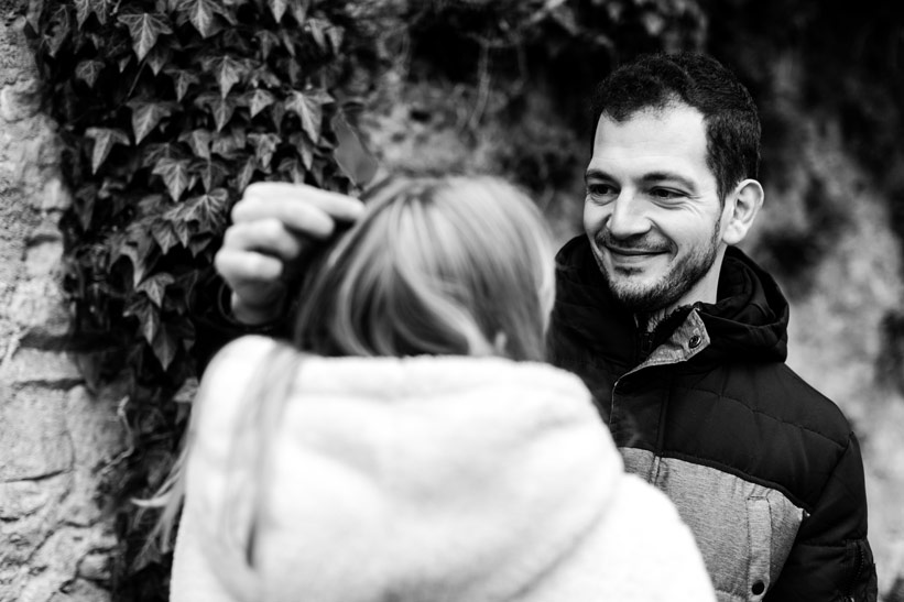 bridal couple having fun in front of the photographer