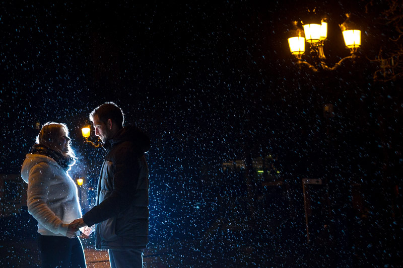 engagement session wtih couple lit backward by external flash