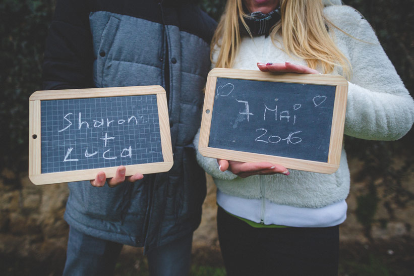 save the date using slates of the photographer