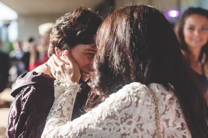 bride kissing her mom