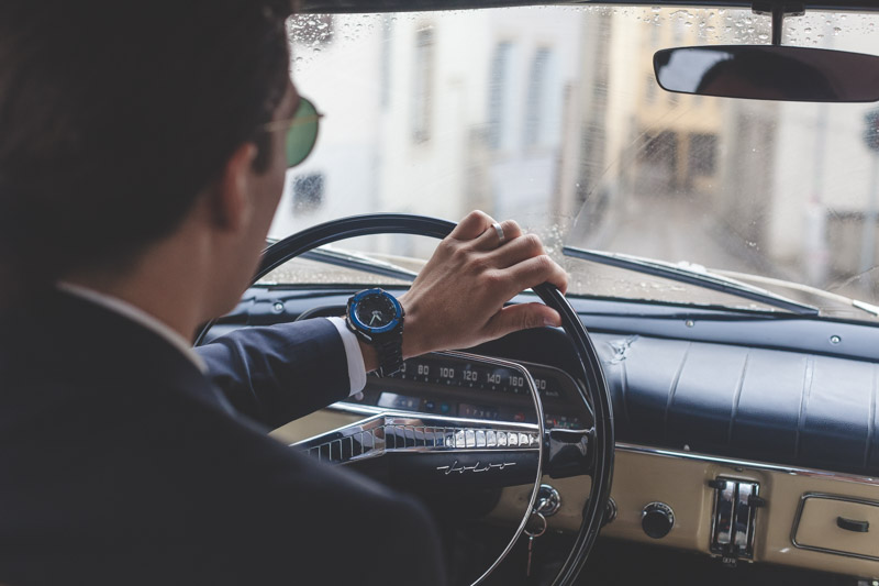 groom driving the car