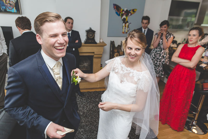happy groom and bride at their home