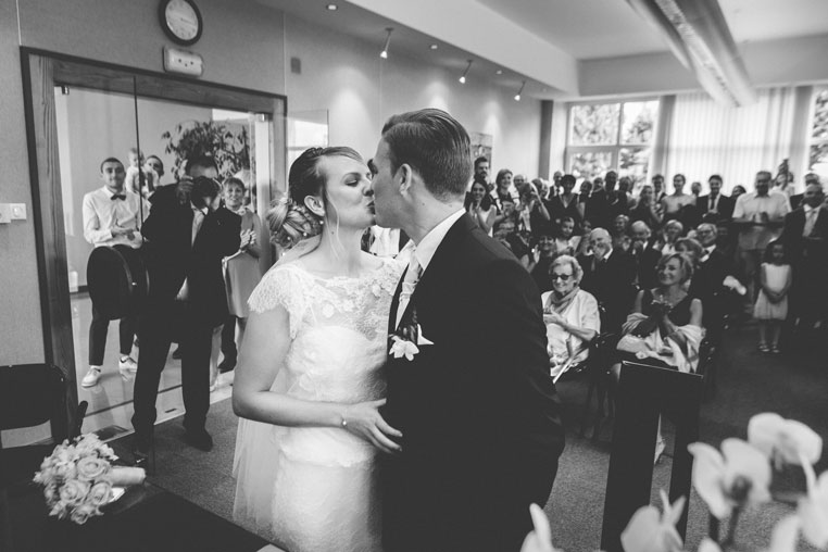 bride and groom kissing at the end of ceremony
