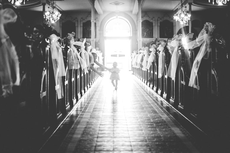 child running down the church alley