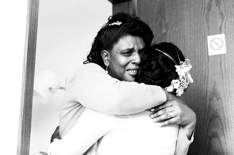 women hugging each other