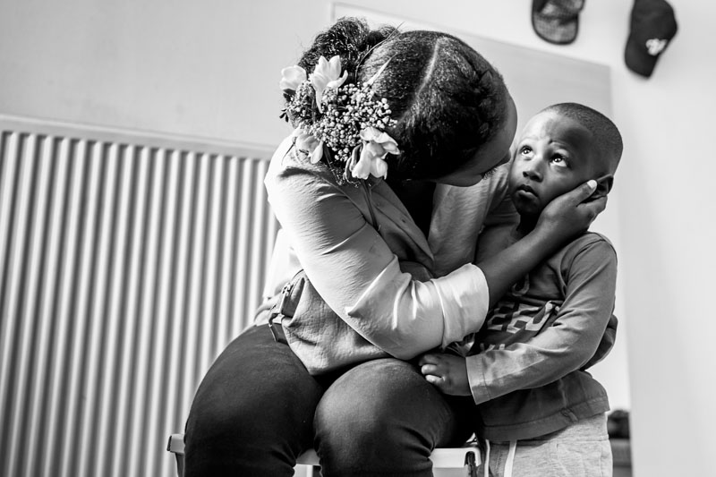 the bride kisses her kid
