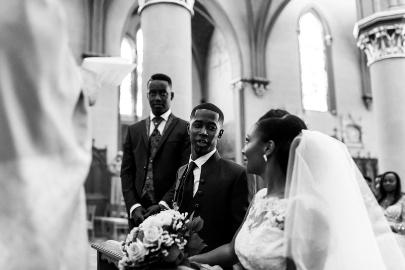 newlyweds in front of the priest