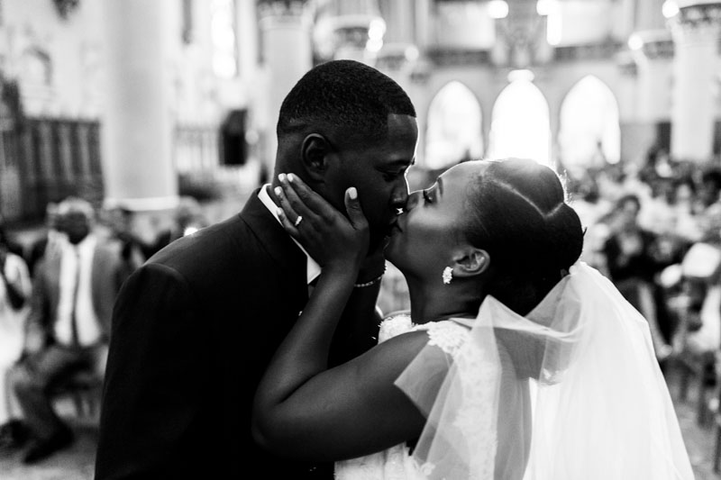 bride and groom kissing as the ceremony ends
