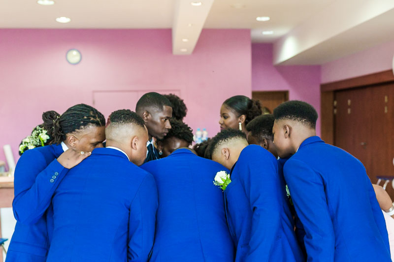 men doing checkup before ceremony